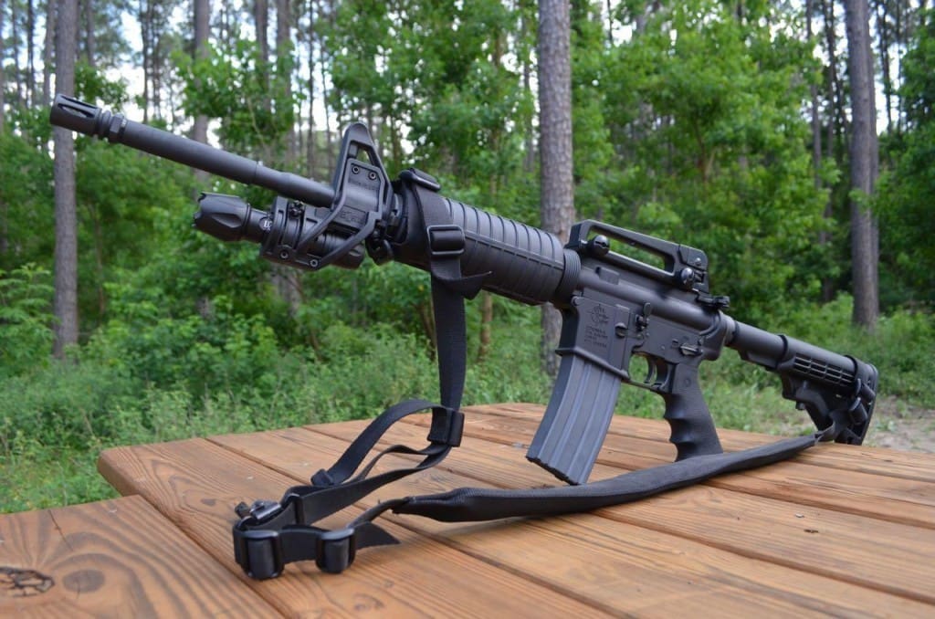 A simple Rock River Arms Defensive Rifle setup. Iron sights, 2 point sling and an Elzetta Light.