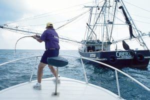 Keith Warren hooks into a monstrous king while fishing spoonfish behind a shrimp boat six miles off the Sabine Jetties.