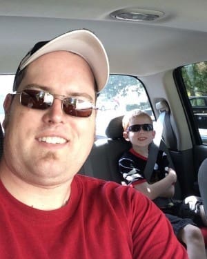 Dustin and Jackson Warncke heading to the lake for a day of fishing fun.