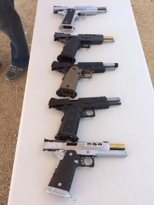 The line-up of STI performance full-size handguns at the media range event.