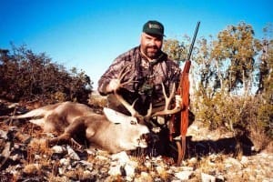 The author shows off a 10-point mule deer buck he killed south of Fort Stockton.
