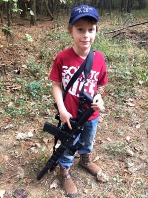 My 8 year old out on a hog hunt with my 300 Blackout. That trigger finger!