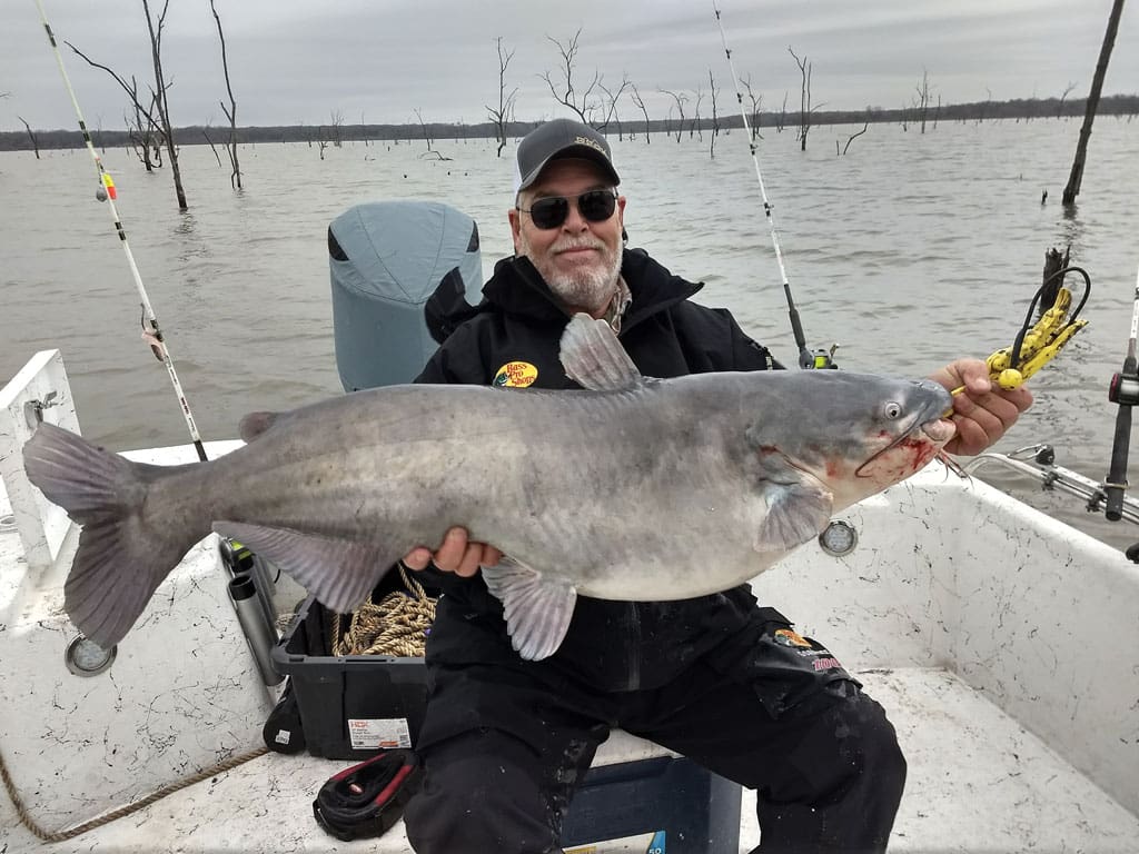 Kenneth Barnett of New London caught this 46-pound catfish on a guided fishing trip on Lake Tawakoni.
