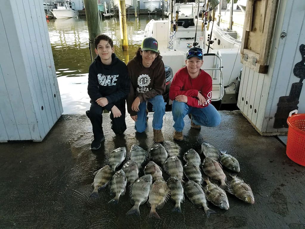 Levi Powell, Esau Powell and Jonathan Holland caught the limit of sheep head in the Galveston Bay on a fishing trip with Clay Wills. The trip was guided by Hingle’s guide service.