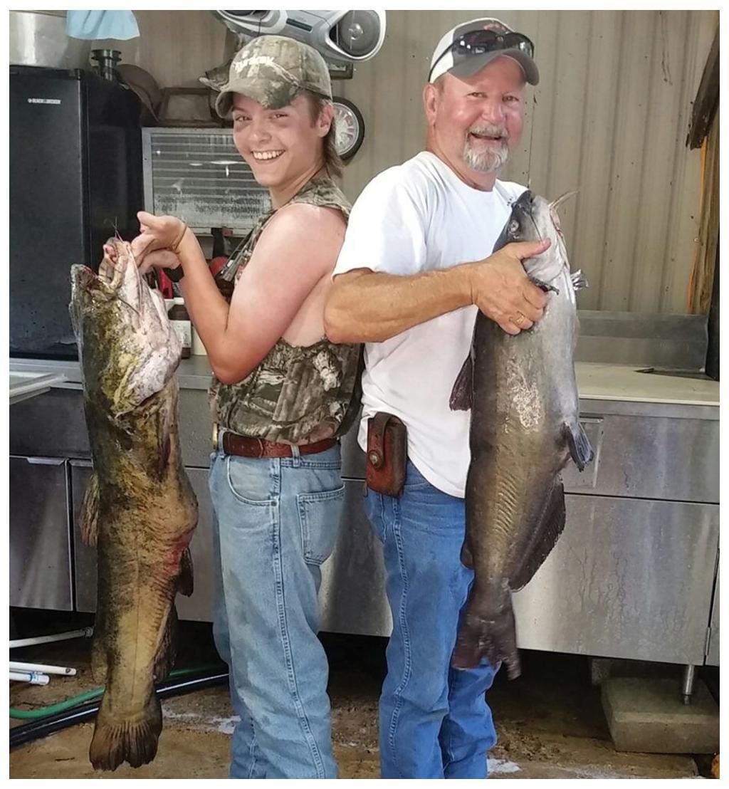 Fourteen-year-old Justin Womack, of Deer Park, and his Grandpa, Doug Womack of Milam, caught this 38-pound flathead and 20-pound blue catfish, along with 8-, 16-, and 30-pound blues on a good two-night run on Lake Toledo Bend.