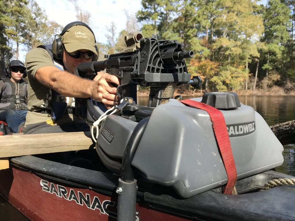 Recoil Rowing a Canoe with a machine gun