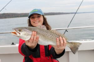 girl with a speckled sea trout