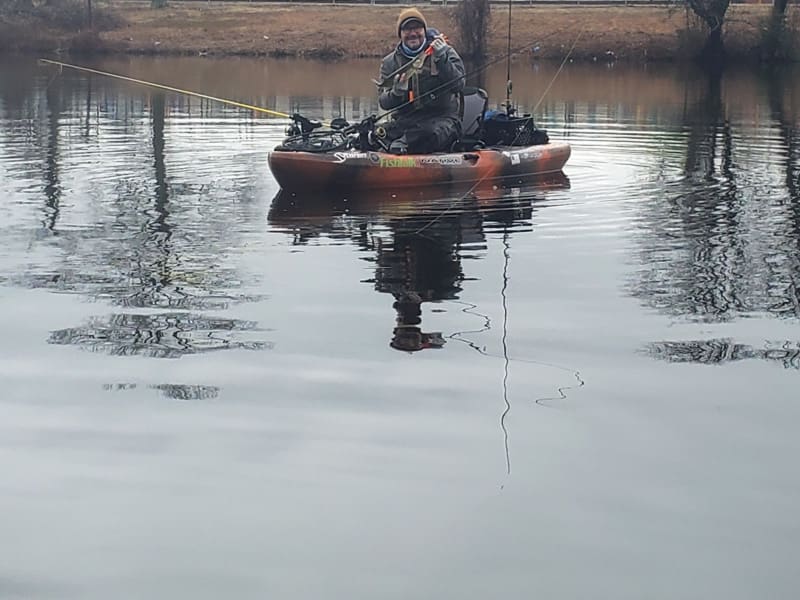 kayak angler back-trolling
