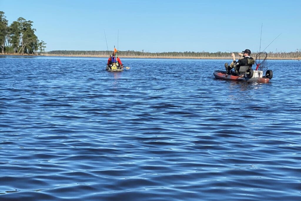 kayak fisherman with net