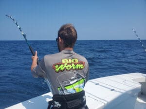 angler in stand up gear tuna