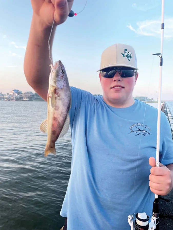 Nathan Childress was excited to catch his first whiting. Whiting are a great option for winter fishing both in the bay and surf.