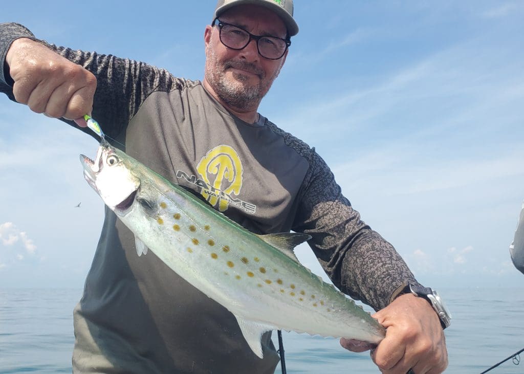 angler with a mackerel