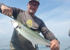 angler with a mackerel