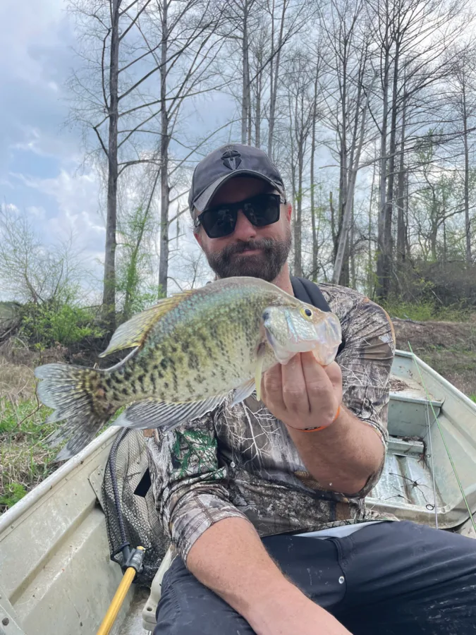 TF&G Editor-In-Chief Chester Moore holds a big white crappie caught in an oxbow off the Sabine River south of the Toledo Bend dam.