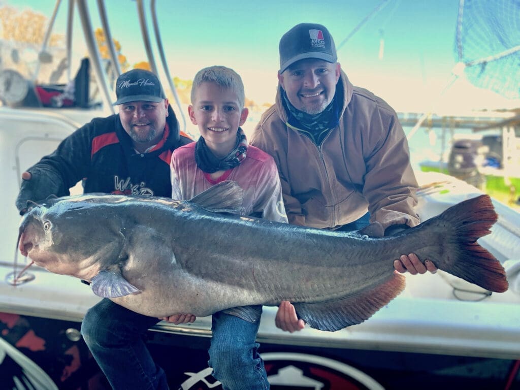 Twelve-year-old Cade Childress and his 72.4-pound blue cat caught on Tawakoni in 2021.