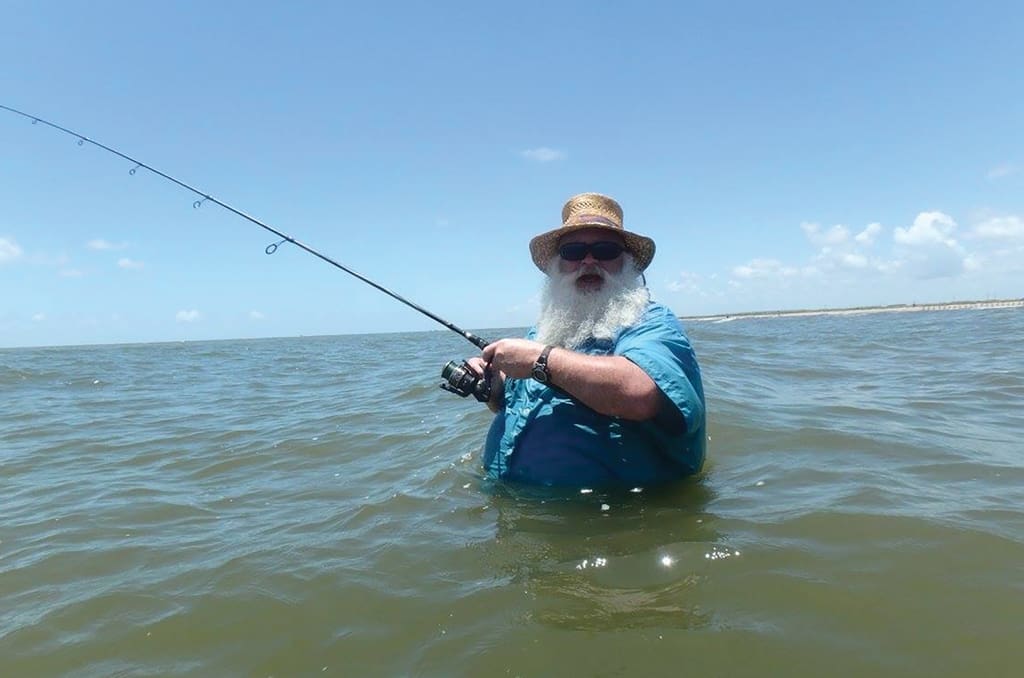 Marcus Heflin enjoys some time in the surf. Late summer is a great time to spend time in the surf seeking specks and other sportfish.