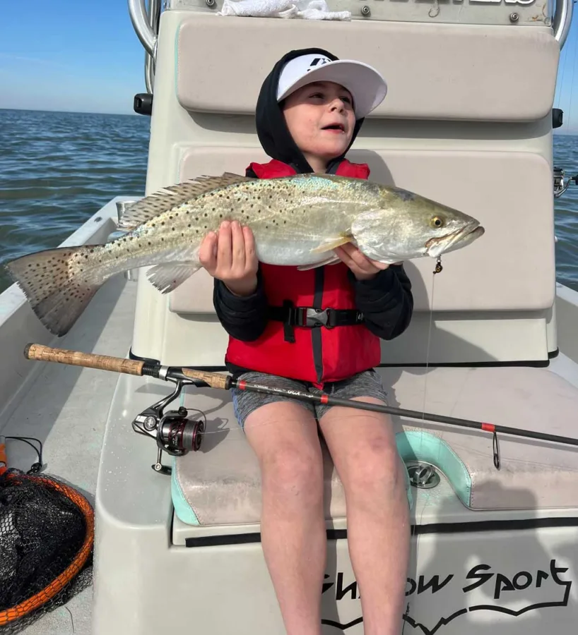 This young angler and his father were fishing the flats with Capt. Barrera in the Holly Beach area when the lad hooked this big overshot trout on a popping cork and live shrimp.