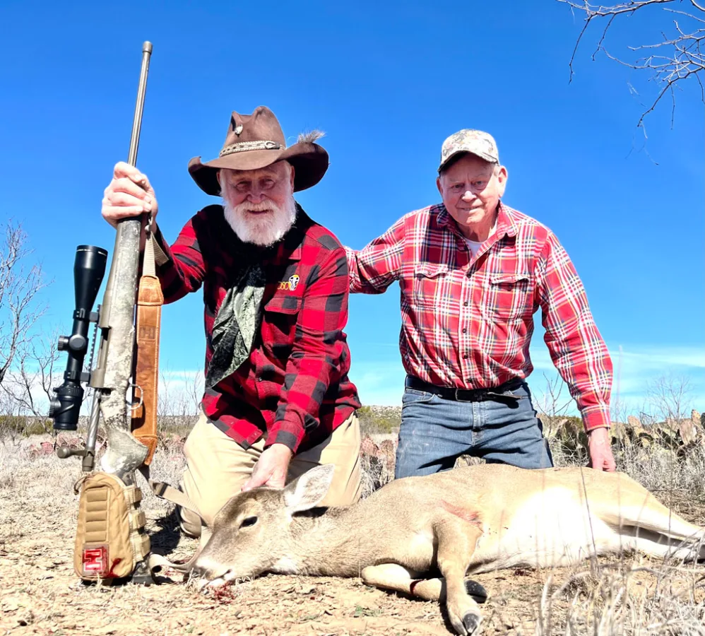 Larry Weishuhn and Luke Clayton with Larry's late season doe.