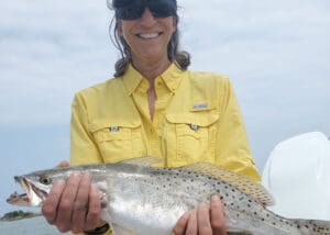 jig head in a trout mouth