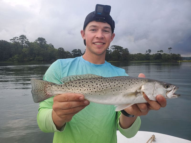 angler with a speckled trout